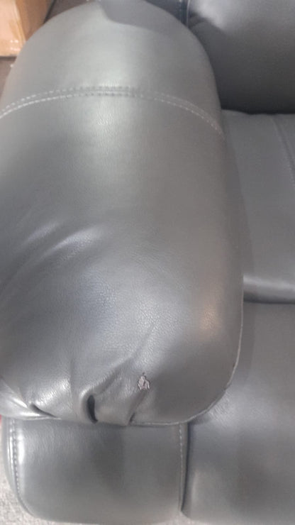 Close-up of the armrest on the Valerie grey leather 3-seater sofa, highlighting the smooth texture and stitching detail