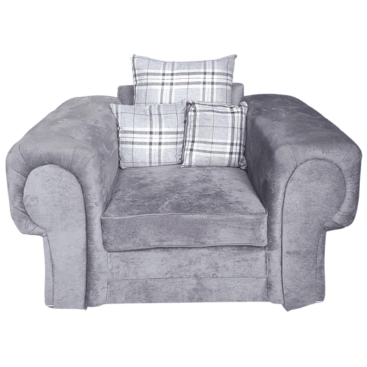 Gray armchair with plaid cushions on a white background