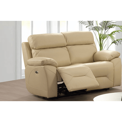 Renato cream two-seater sofa in a cozy, modern living room setting, complemented by neutral décor, soft lighting, and stylish accents.