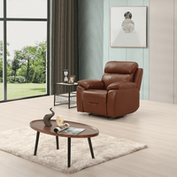 Renato Tan armchair in a modern roomset, white upholstery, stylish and comfortable living room furniture