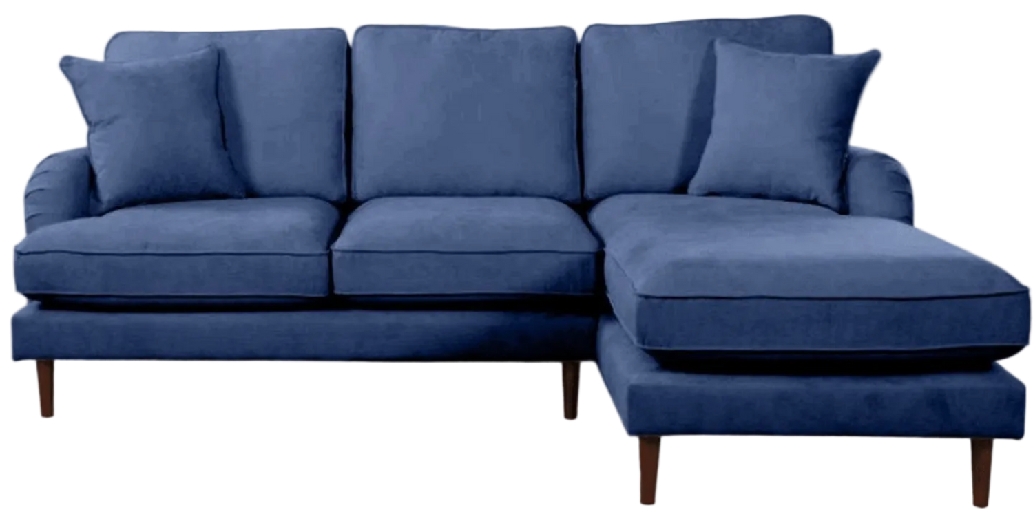 Blue sectional sofa with cushions on a white background