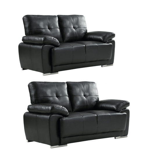 Two black leather sofas on a white background