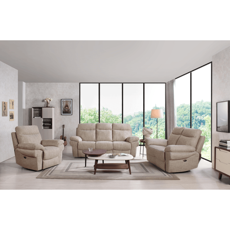 Beige sofa set in a modern living room with large windows.