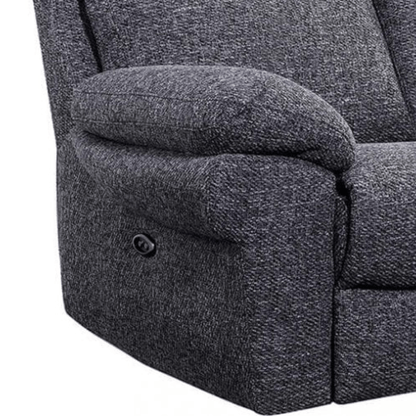 Gray recliner chair with button details on a white background