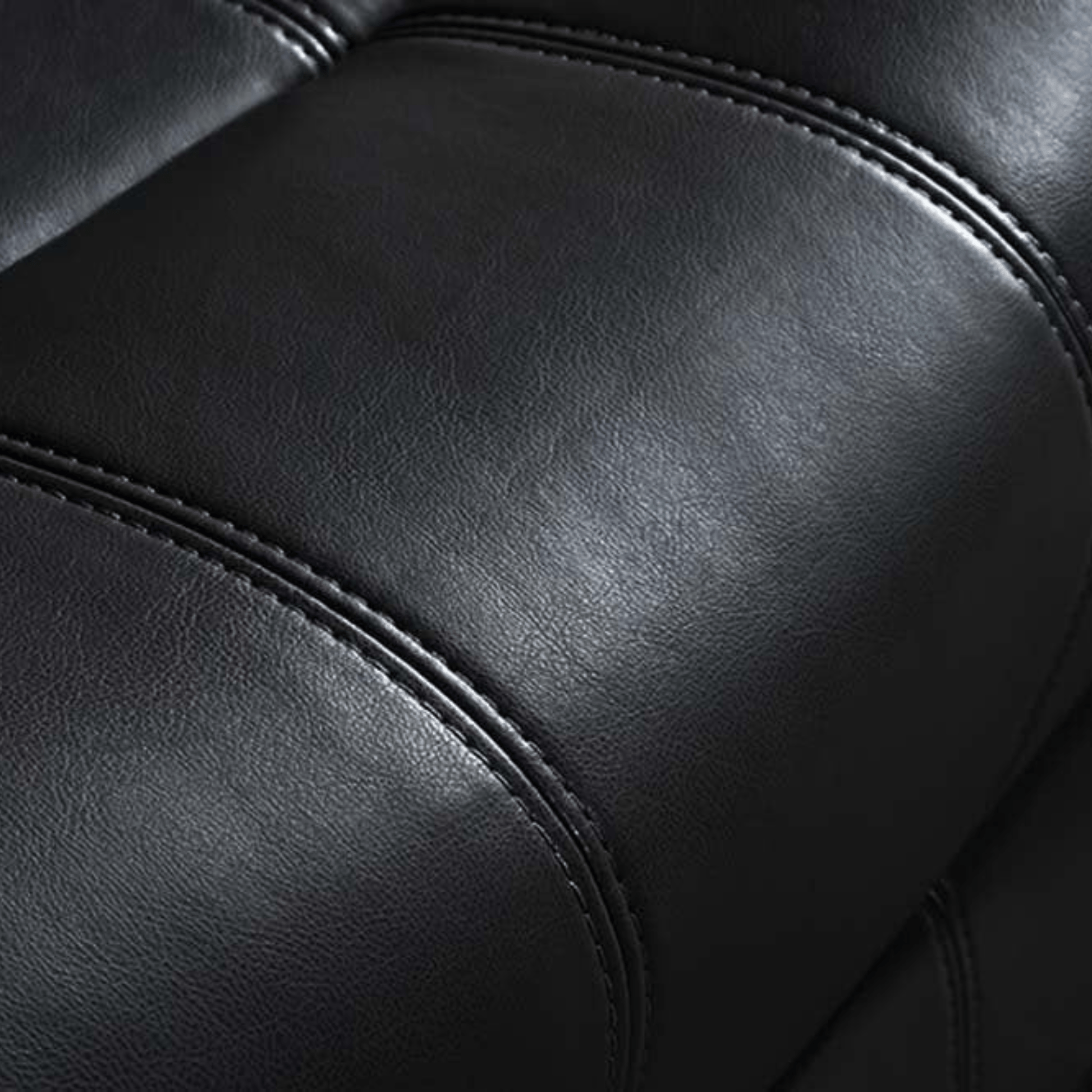 Close-up of black leather sofa texture