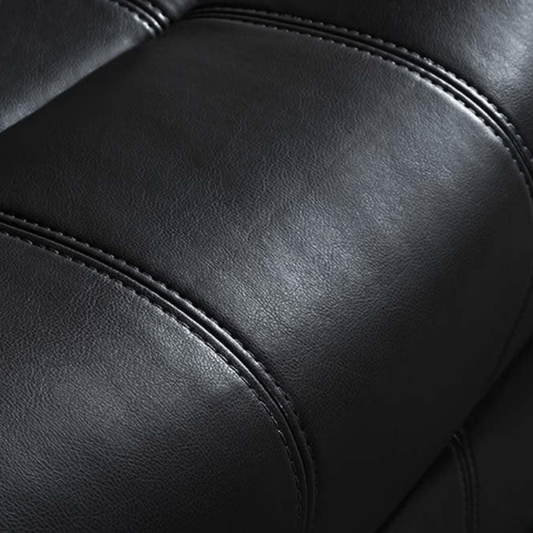 Close-up of black leather sofa texture