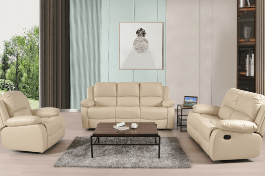 Beige recliner sofa set in a living room with a coffee table and decorative items.
