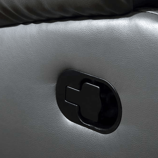 Close-up of a car door handle on a gray interior.