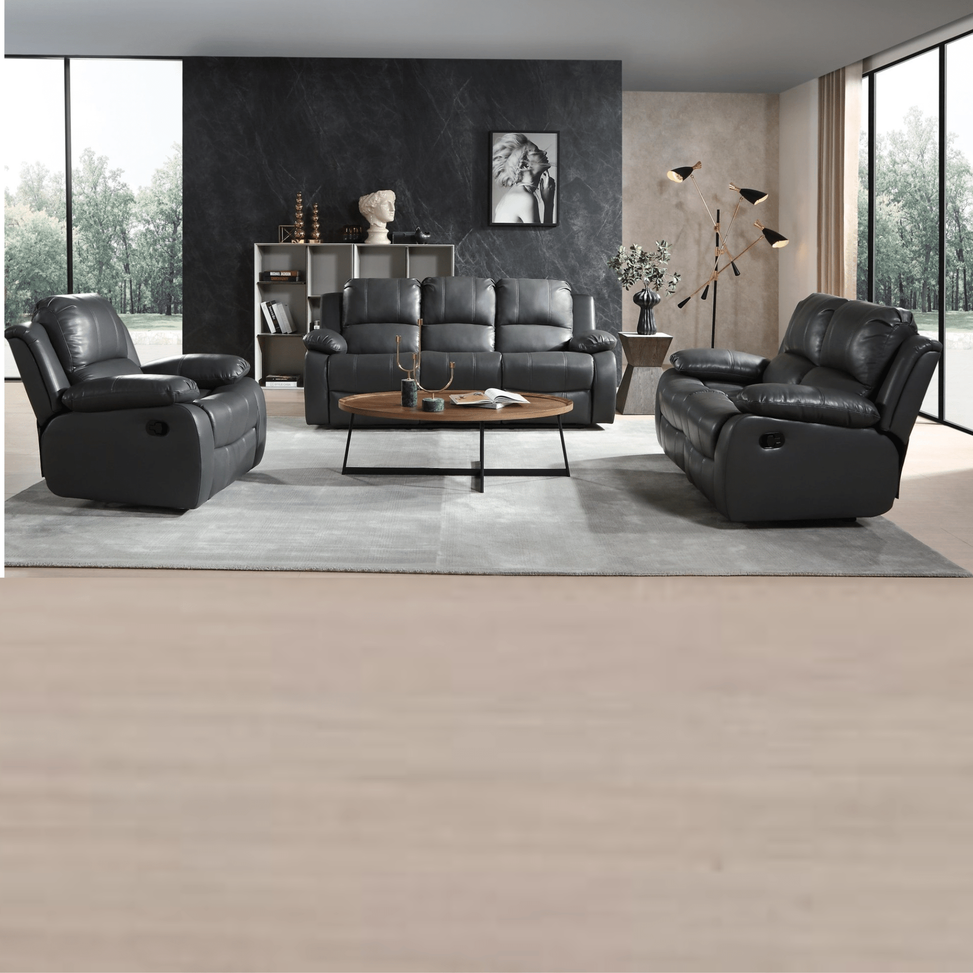Modern living room with black leather sofa set and coffee table.
