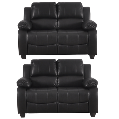 Two black leather recliners on a white background