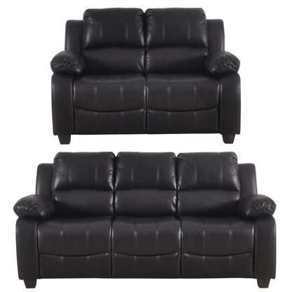 Two black leather sofas on a white background