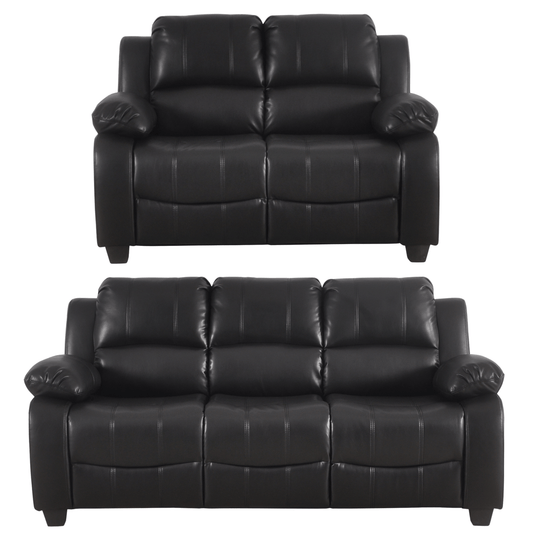 Two black leather sofas on a white background