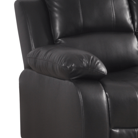 Close-up of a black leather recliner chair with a pillow on a white background
