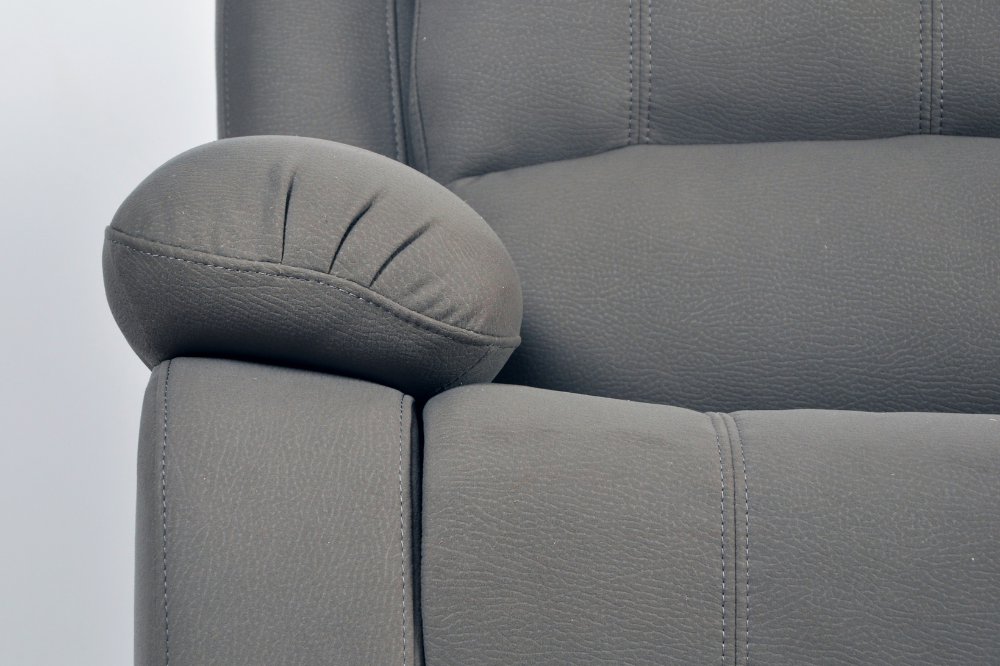 Close-up of modern light grey fabric sofa – textured upholstery detail of contemporary living room furniture