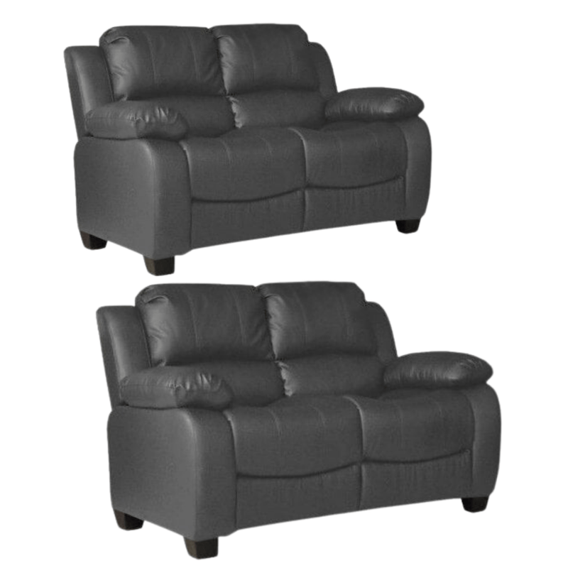 Two gray leather recliner sofas on a white background