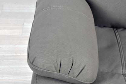 Close-up  arm view of modern light grey fabric sofa – textured upholstery detail of contemporary living room furniture