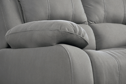 Close-up side view of modern light grey fabric sofa – textured upholstery detail of contemporary living room furniture
