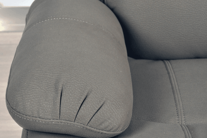 Close-up of modern light grey fabric sofa – textured upholstery detail of contemporary living room furniture