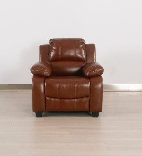 Tan leather armchair on a light wooden floor with a white wall background front facing
