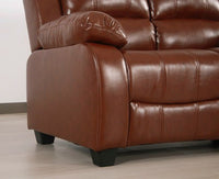 Detailed view of the side and base of the tan leather-Aire sofa, showing the square black foot.
