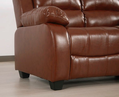 Detailed view of the side and base of the tan leather-Aire sofa, showing the square black foot.
