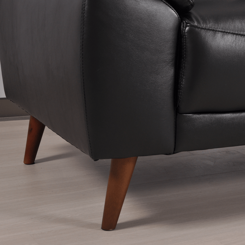 Vantage 2-seater black sofa close-up, highlighting texture, stitching, and modern design details.