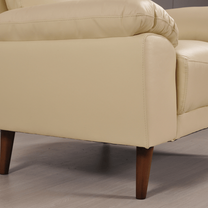 Vantage Cream armchair, close-up view in a styled living room, modern and cozy seating