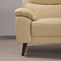 Vantage Cream 2-seater sofa, close-up view in styled living room, modern and cozy seating