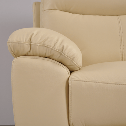 Vantage Cream armchair, close-up view in a room setting, modern and cozy living room seating
