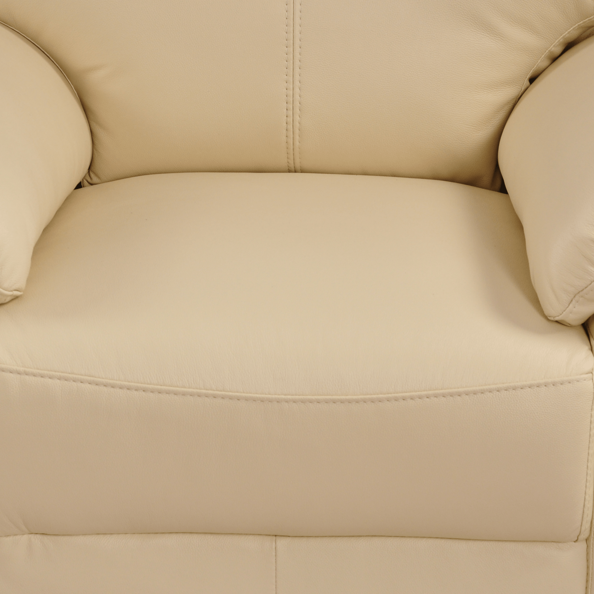 Vantage Cream armchair, close-up in a styled living room, modern and cozy seating