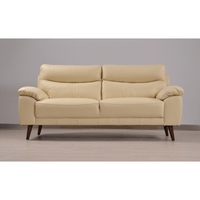 Vantage Cream 3-seater sofa in styled living room, modern and cozy seating arrangement