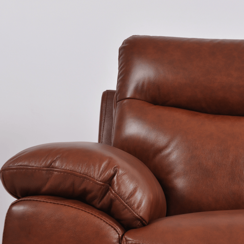 Close-up of Vantage tan armchair showing soft fabric and padded seat for comfort