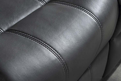 Verona sofa Close-up of a dark gray leather seat with stitching details