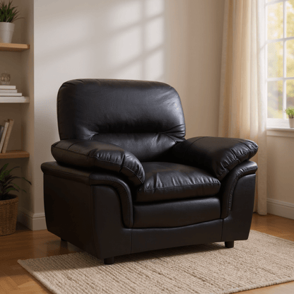 Black leather armchair in a living room setting with a window and bookshelf in the background.