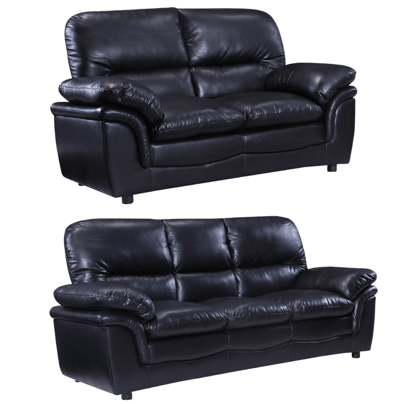 Two black leather sofas on a white background