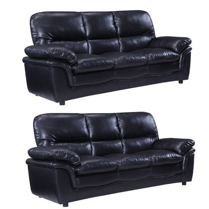 Two black leather sofas on a white background