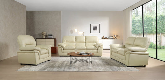 Beige leather sofa set in a modern living room with large windows.