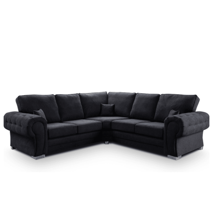 Black sectional sofa on a white background