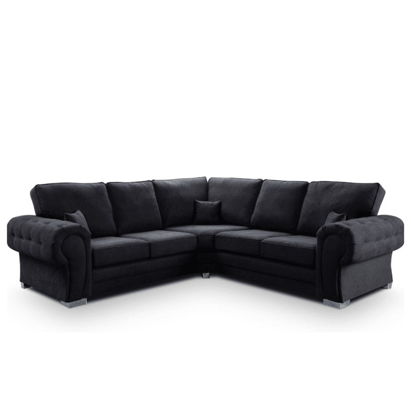 Black sectional sofa on a white background