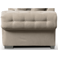 Beige upholstered chair with tufted backrest on a white background