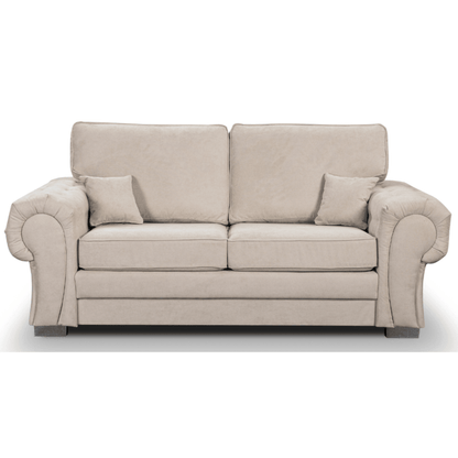 Beige sofa with two cushions on a white background