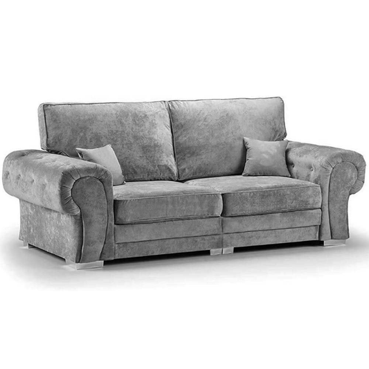 Gray sofa with two cushions on a white background