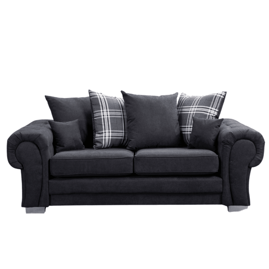 Gray sofa with plaid cushions on a white background
