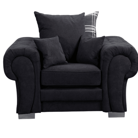 Black armchair with cushions on a white background