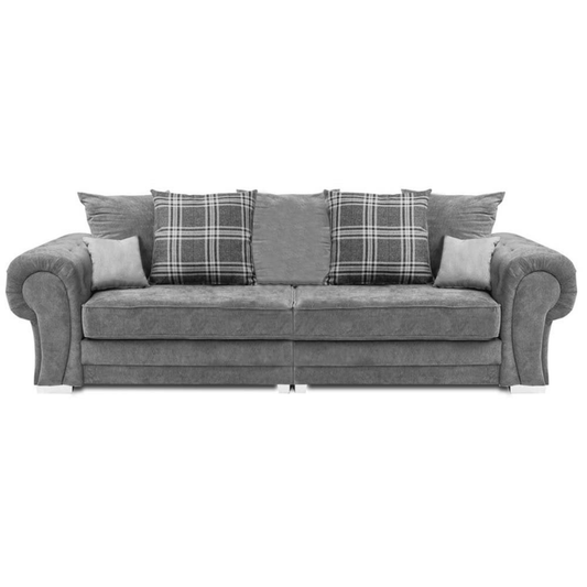 Gray sofa with plaid and solid cushions on a white background